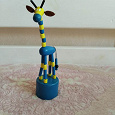 Отдается в дар Игрушка танцующий жираф