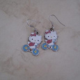 Отдается в дар Серёжки Hello kitty! на велосипеде
