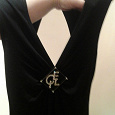 Отдается в дар платье xs чёрное. с интересным вырезом на спине.