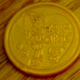 Отдается в дар Пластиковая монетка — медалька от Живчика