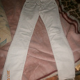 Отдается в дар белые джинсы размер 40