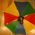 Отдается в дар Цветной зонт на голову