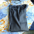 Отдается в дар Школьные брюки серого цвета.
