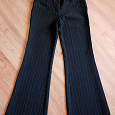 Отдается в дар Абсолютная классика: черные брюки в тонкую белую полоску.