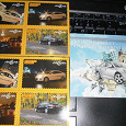 Отдается в дар Три рекламные открытки с машинами.