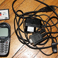 Отдается в дар З/У + дата-кабель телефона Siemens старого образца.