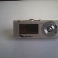 Отдается в дар MP3 плеер рабочий, НО сломана крышечка которая держит батарейку