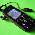 Отдается в дар Мобильный телефон Nokia 1661 + проводная гарнитура к нему