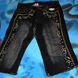 Отдается в дар джинсы чёрные с вышивкой рост 120-130