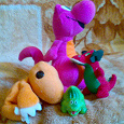 Отдается в дар мягкие игрушки-стадо динозавров