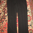 Отдается в дар Стильные прямые черные брюки, размер 42-44.