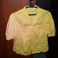 Отдается в дар жёлтая блузка 48 размер