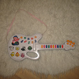 Отдается в дар музыкальная игрушка гитара