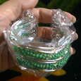 Отдается в дар браслет «волна» из зелёного и серебристого бисера новый