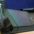 Отдается в дар смартфон HTC TITAN и девайсы к нему