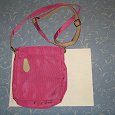 Отдается в дар Новая текстильная набедреная сумка, пастельно розового цвета, альбомный лист для понимания размера.