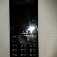 Отдается в дар Новый сотовый телефон Alcatel One Touch 2007D