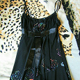 Отдается в дар Платье сарафан на лето чёрное с цветным рисунком 42-44 (S)