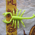 Отдается в дар игрушка — салатовый скорпион