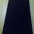 Отдается в дар Черная юбка (классика) ниже колен. 48 размер.