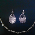 Отдается в дар серебряный браслет (подарен) и серьги (не уверенна что серебряные)