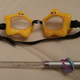 Отдается в дар Детские очки для плавания и светящаяся палочка