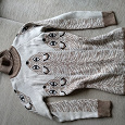 Отдается в дар Женский свитер 40 размера.