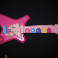 Отдается в дар игрушечная гитара