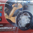 Отдается в дар Игровой манипулятор с рулем и педалями Genius TwinWheel F1