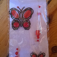 Отдается в дар Подвеска декоративная красная с бабочками