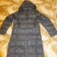 Отдается в дар Женское пальто-пуховик б/у чёрного цвета с капюшоном р.44-46, длина 105 см.