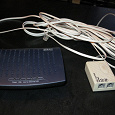Отдается в дар Внешний ADSL-модем (роутер) и ADSL сплиттер HPM-004