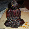 Отдается в дар Фигурка Будды, статуэтка негра и очки от солнца