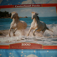 Отдается в дар Пазл Два белых коня, 1000 штук, новый.
