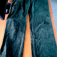 Отдается в дар Темно зеленые, стильные брюки gilio