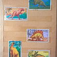 Отдается в дар марки: набор динозавров