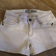 Отдается в дар белые джинсовые шорты MODIS 40-42