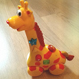 Отдается в дар Музыкальная игрушка жираф