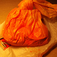 Отдается в дар Краска для Холи. Примерно 3/4 пакета. Цвет- ярко оранжевый.