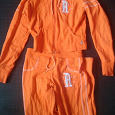 Отдается в дар Спортивный костюм женский оранжевый.
