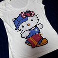 Отдается в дар Купальник, футболка Hello Kitty и ремень