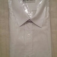 Отдается в дар Классическая белая рубашка прямого кроя с длинным рукавом.размер XL.2шт…
