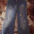 Отдается в дар красивые джинсы девочке на 5-6лет