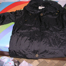 Отдается в дар женская куртка черного цвета на весну р-р 56