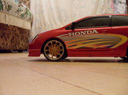 Отдается в дар «Радиоуправляемая модель 1:16 HONDA CIVIC, красная»