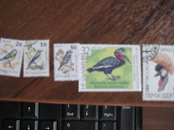 Отдается в дар «почтовые марки-птицы»
