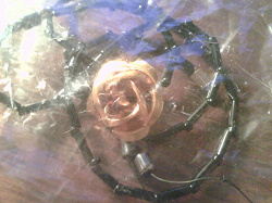 Отдается в дар «кулон железная роза»