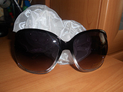 Отдается в дар «Новые солнцезащитные очки»