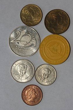 Отдается в дар «3 юбилейные монетки Казахстана»