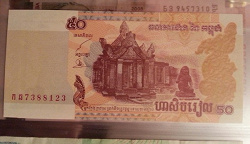 Отдается в дар «50 и 100 риелей Камбоджи»